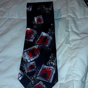 Oscar de la Renta 100% silk pattern necktie.